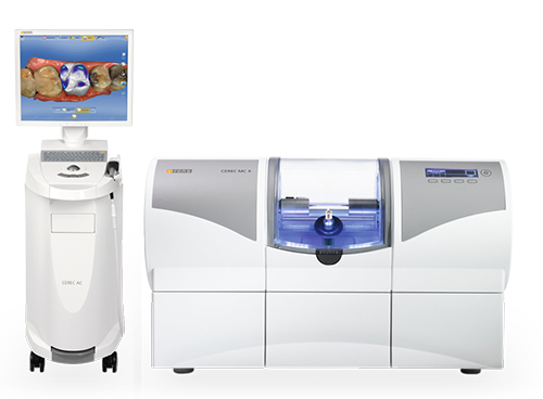 The image shows a collection of laboratory equipment including a large machine with a digital display, a smaller device with a blue object inside, and a robotic arm, all displayed on a white background with a monitor showing an image of a chocolate bar.